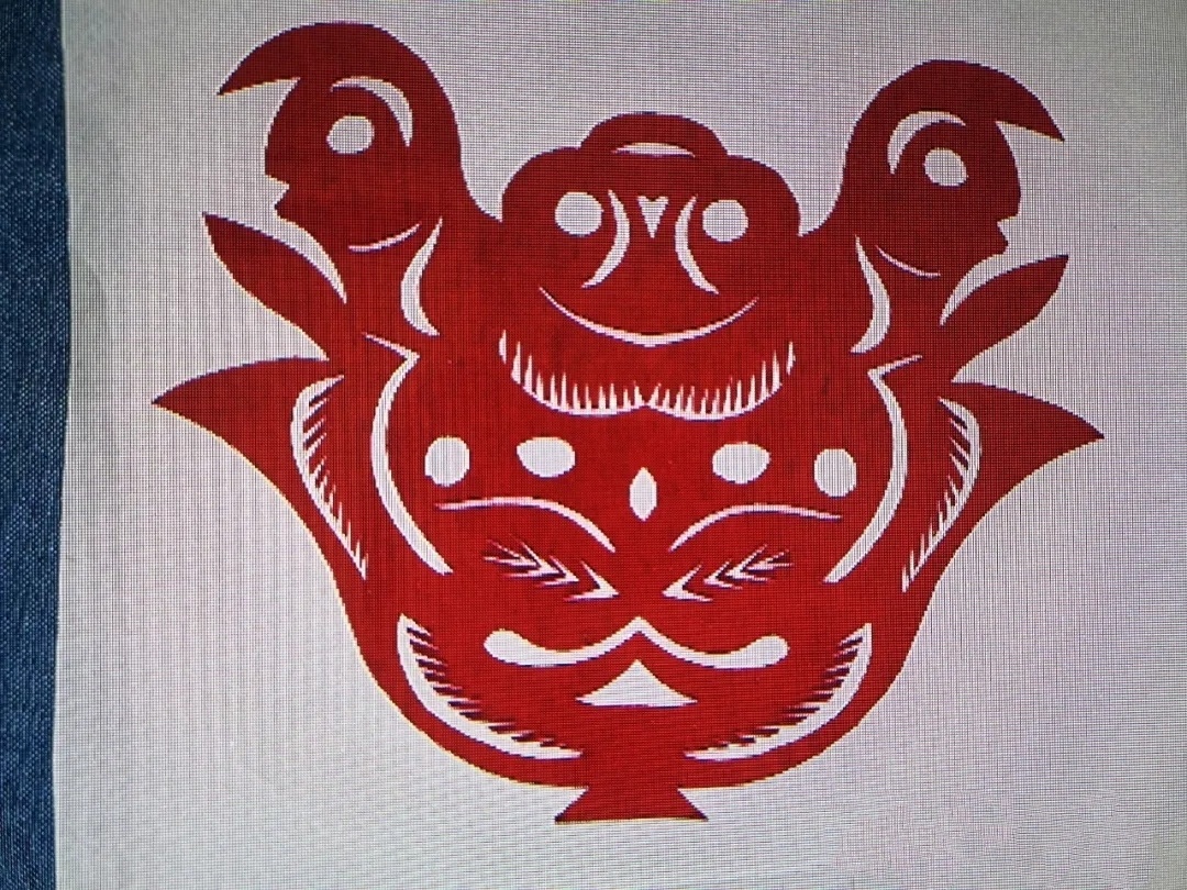 宝鸡千阳剪纸的染色以单色和对称图型为主